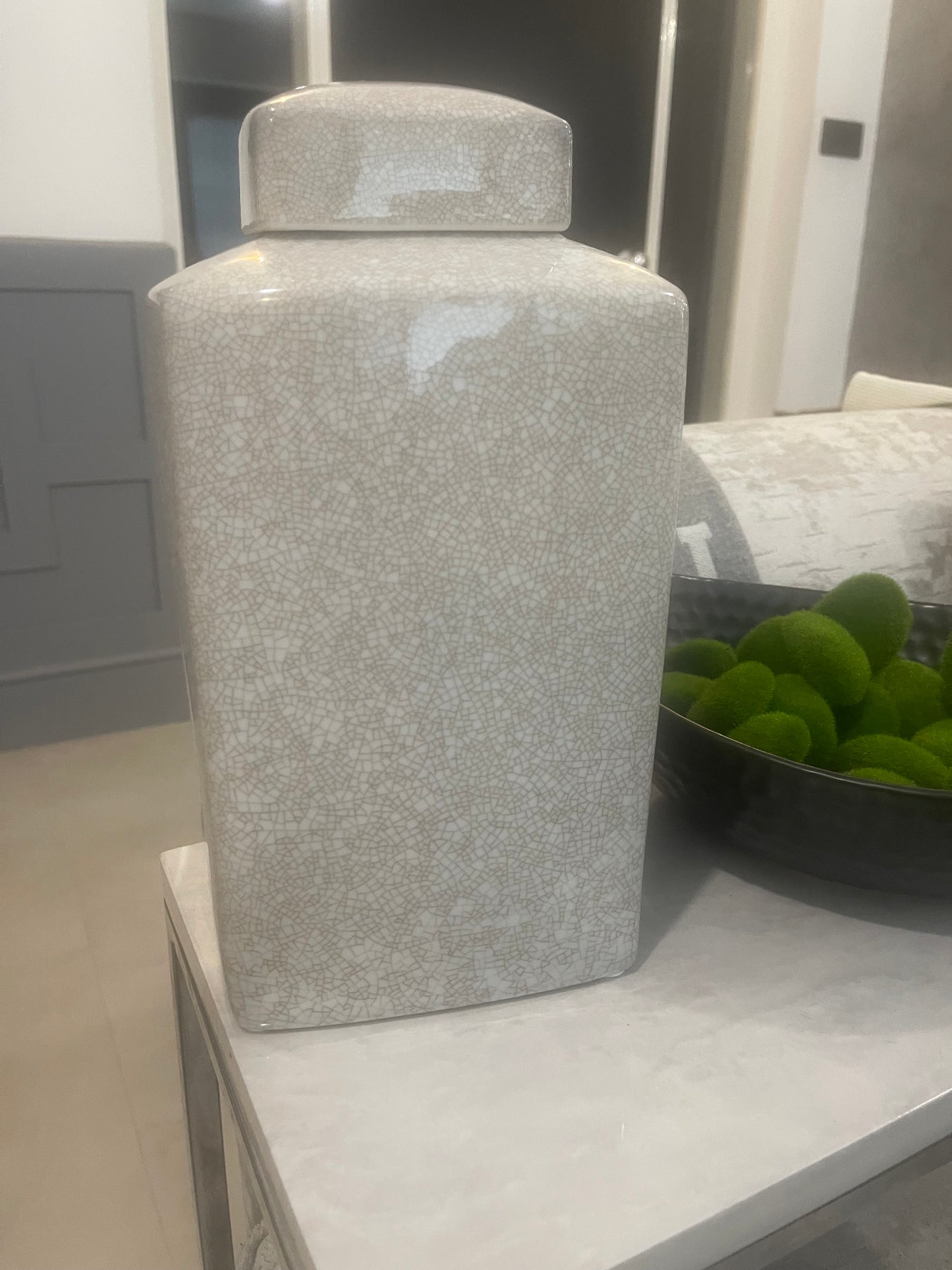 Beige and white jar