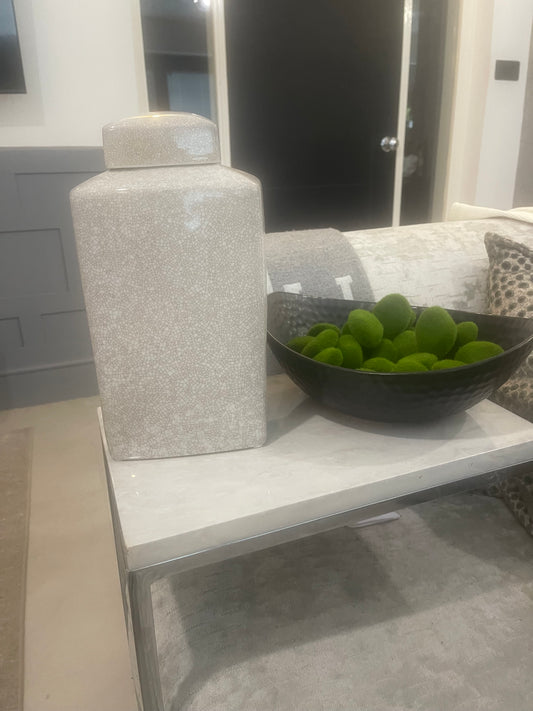 Beige and white jar
